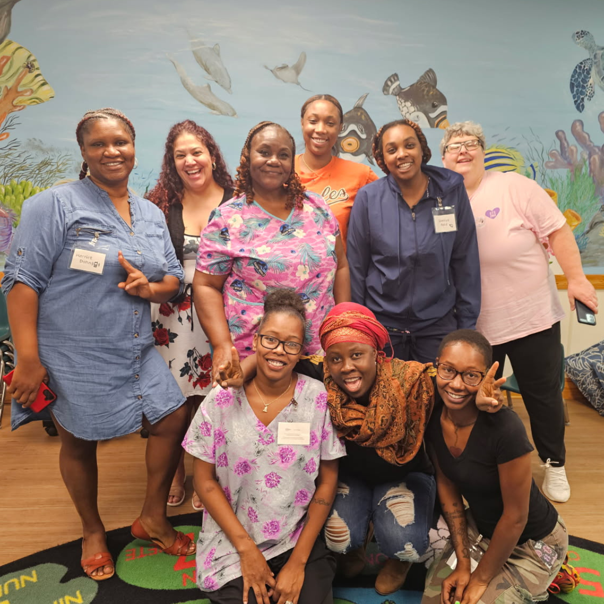 Home page News CTA - Group of ladies posing for photo in classroom