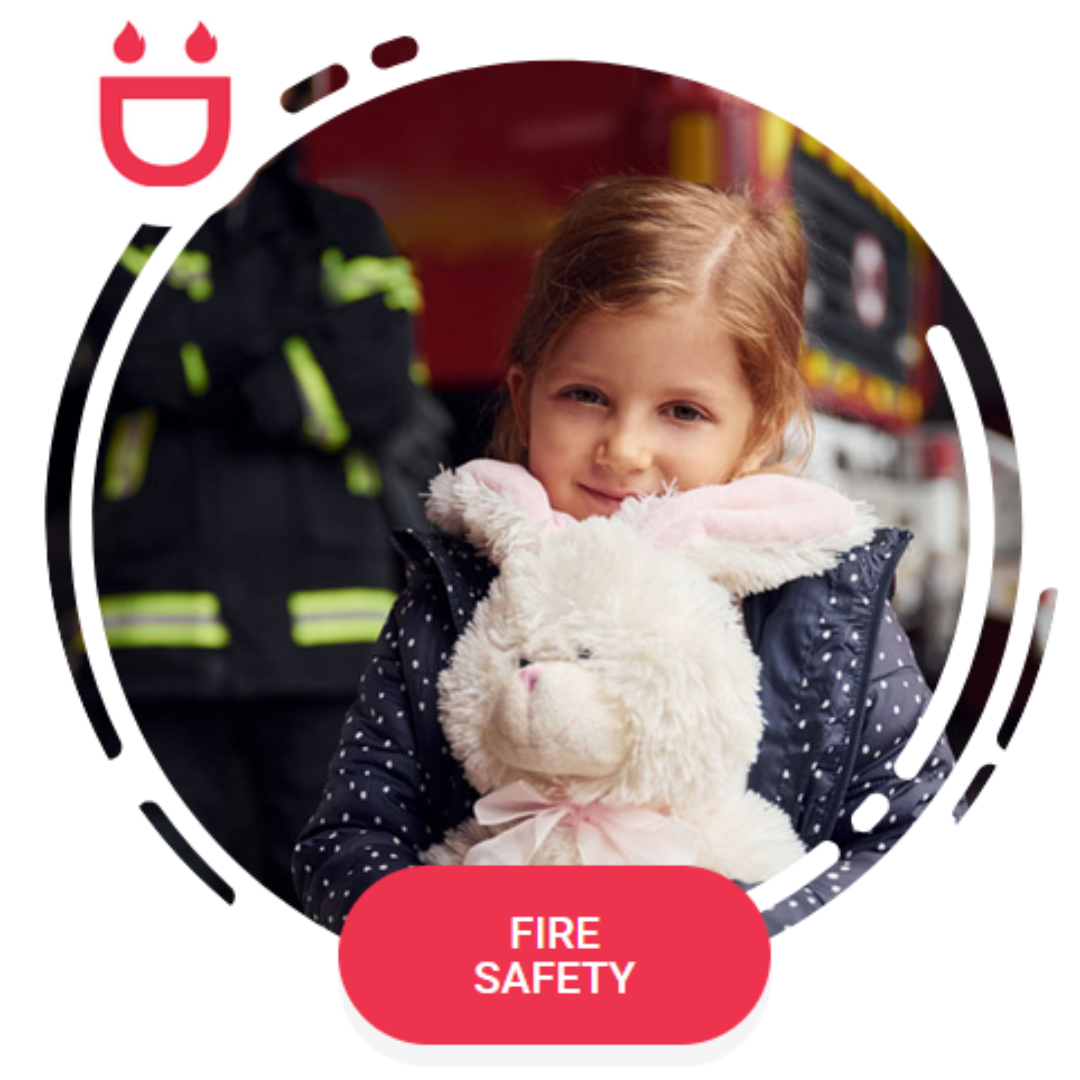 Fire safety: girl hugging stuffed bunny toy