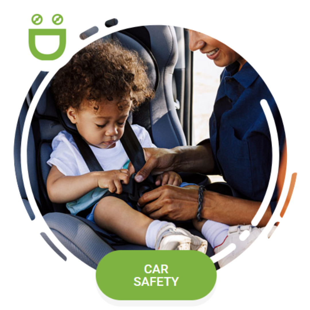 Toddler getting buckled into car seat